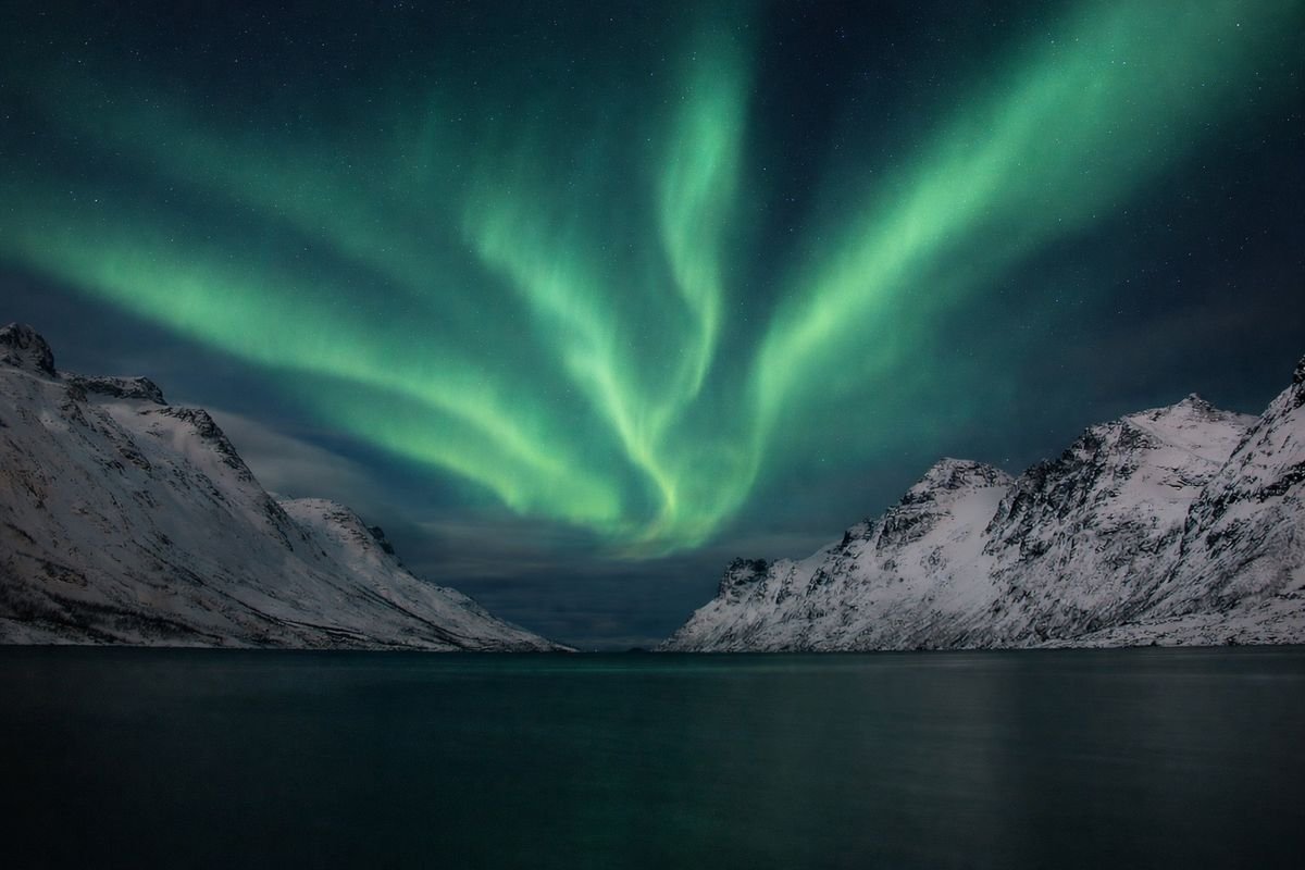 Northern lights over the fjord near Tromsø